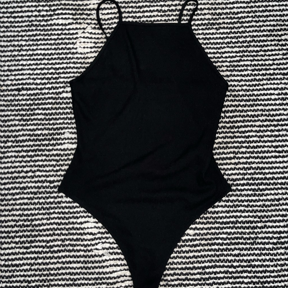 Black ripped bodysuit